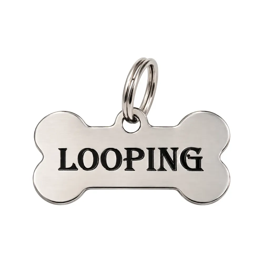 Médaille os argentée gravée du prénom Looping en lettres noires, avec anneau argenté