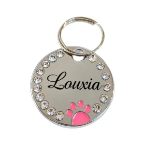 medaille-ronde-strass-rose-louxia Médaille ronde strass personnalisée rose, gravée du prénom Louxia, avec une patte émaillée rose et des strass autour